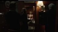The Warrens placing Annabelle in the room (Image via YouTube/Warner Bros.)